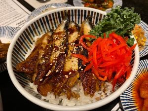 Savory unagi don paired with tsukedashi at Sushi Misong, a standout spot for Duluth sushi lovers.